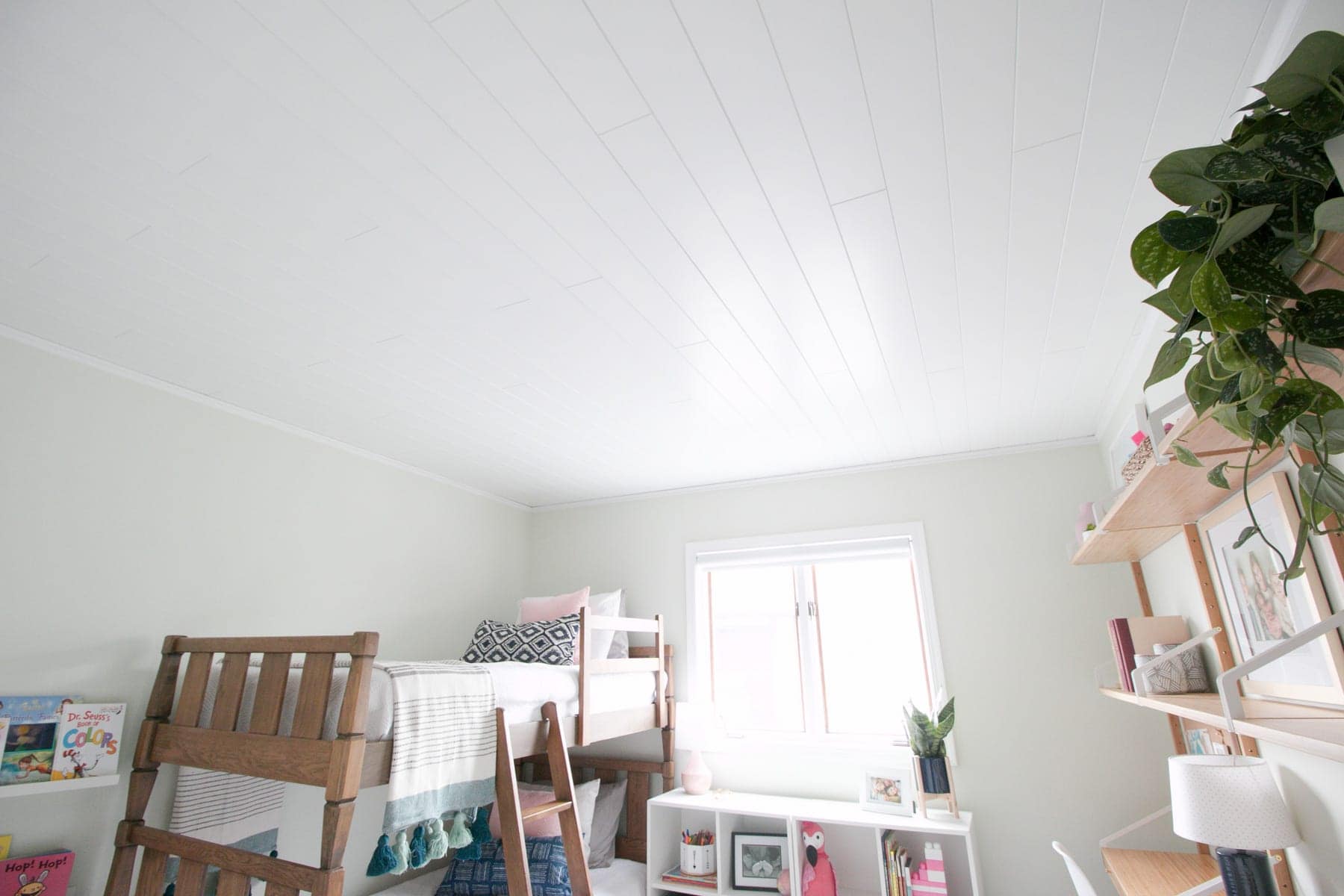 This popcorn ceiling is covered by ceiling planks from Armstrong ceilings. 