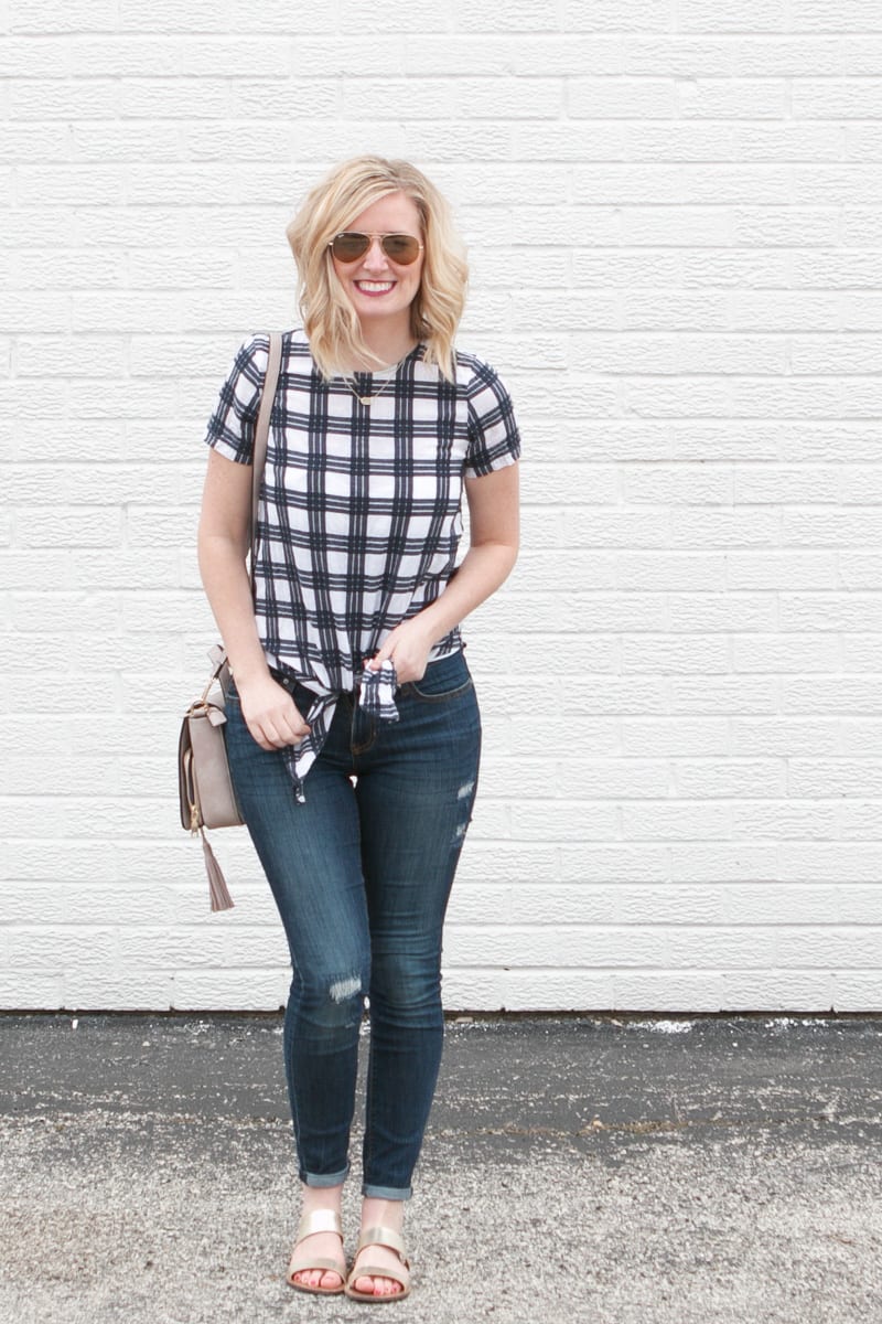 Jeans, a patterned top, and gold sandals make for the perfect spring outfit. 