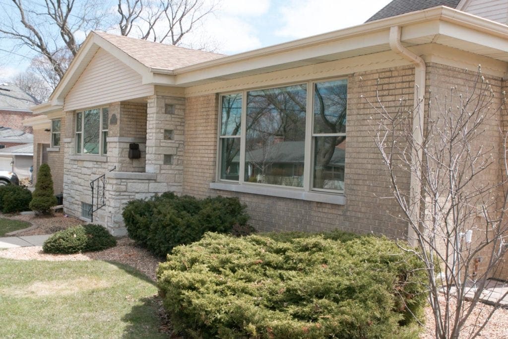outdated 1950's ranch with new landscaping