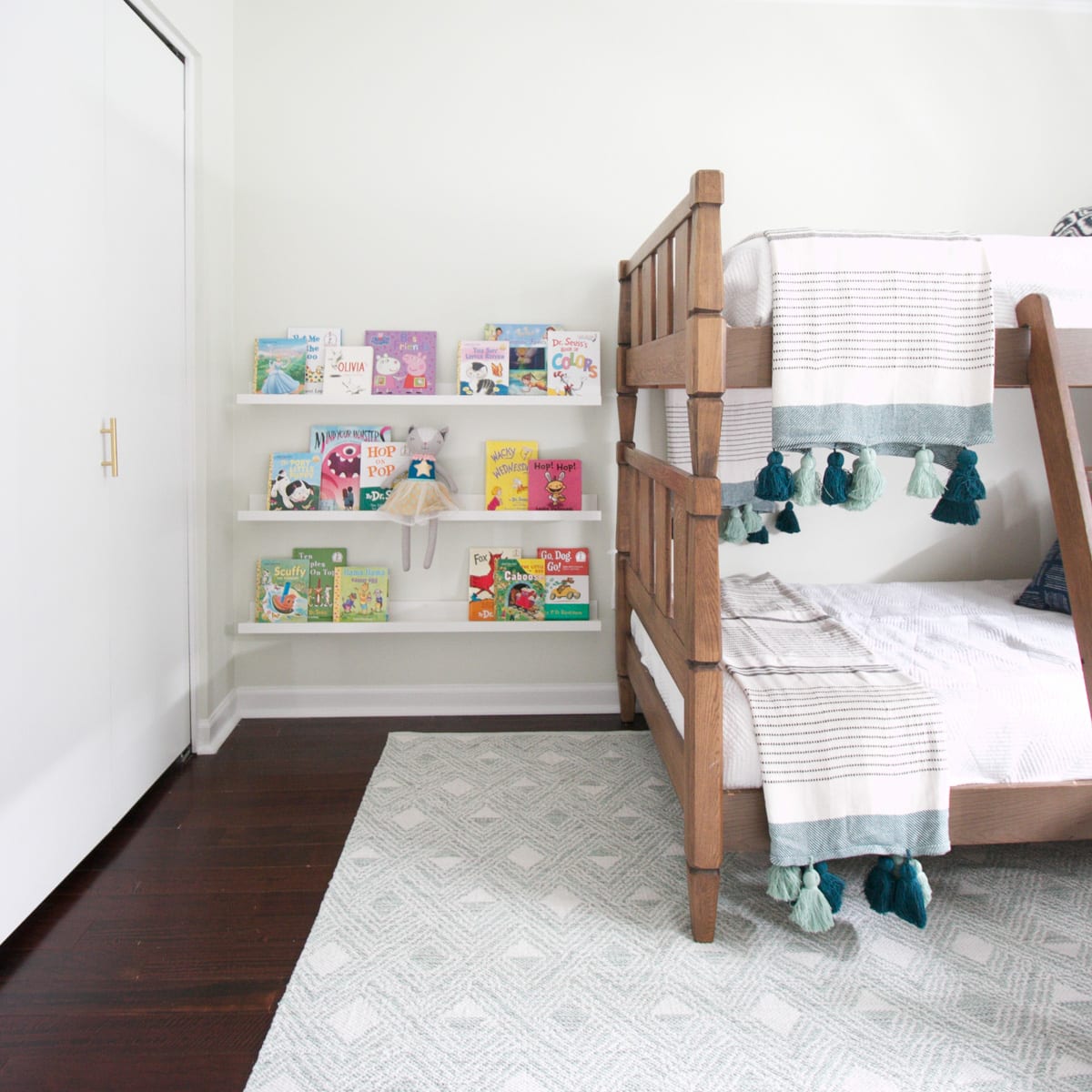 If you have open wall space, consider adding book ledges in your child's room. 