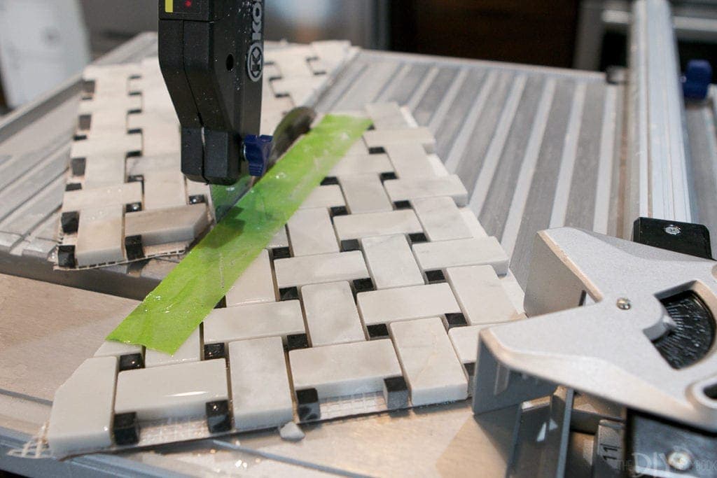 Use painter's tape when making angled cuts on marble