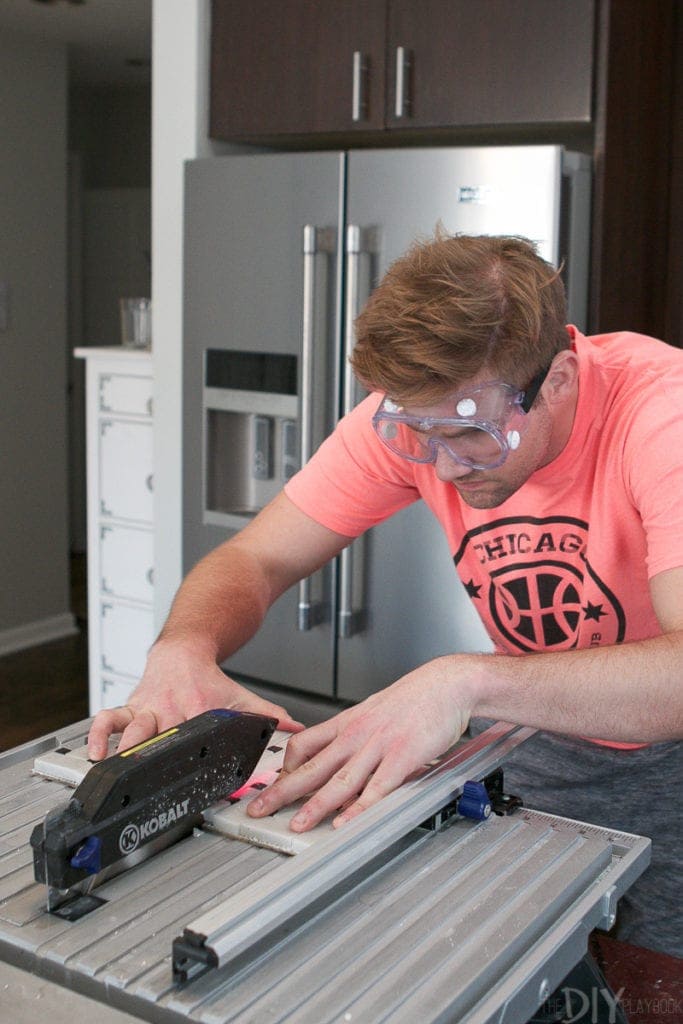 Using a wet saw to cut tile