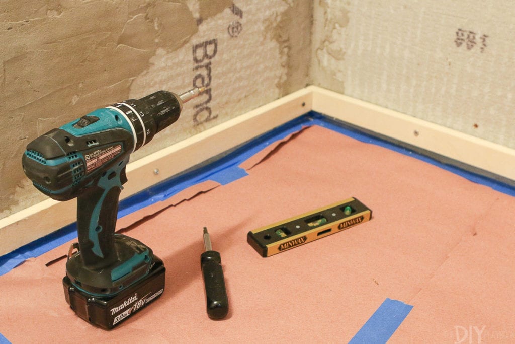 You'll need to have a drill and level on hand to install the ledgers