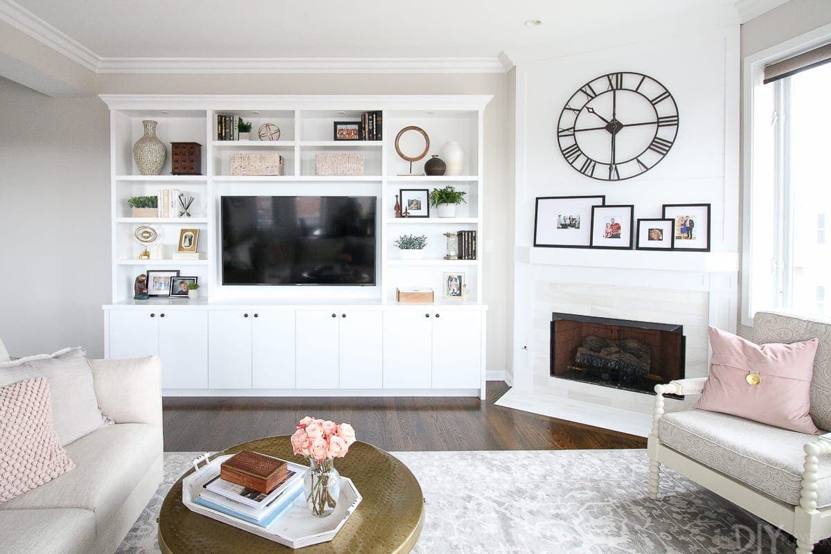 White built-ins and a white fireplace makeover