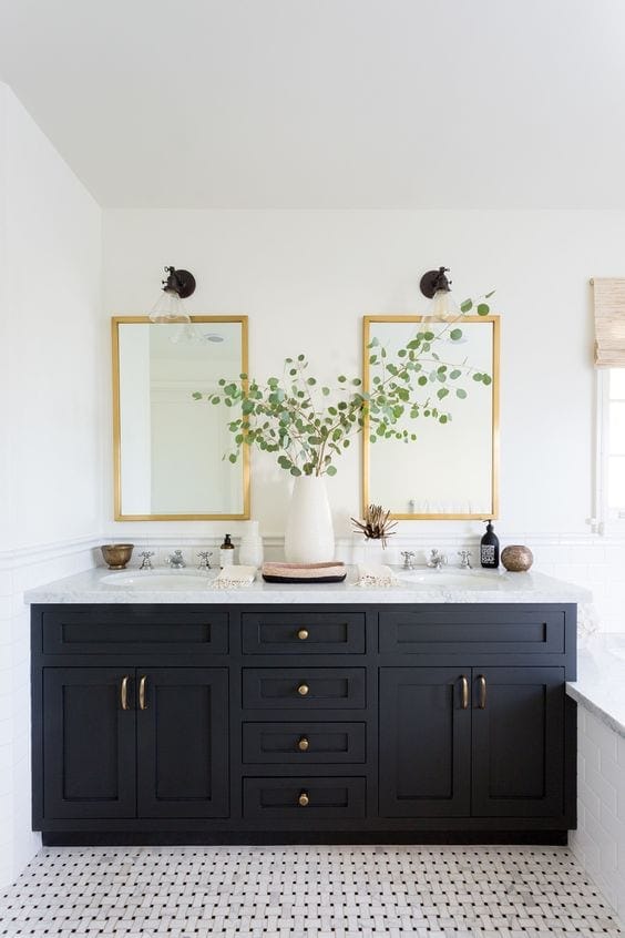 Black vanity with gold mirrors