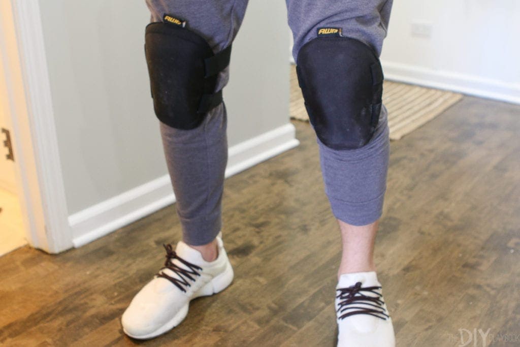 Wear kneepads when removing floor tile in your bathroom