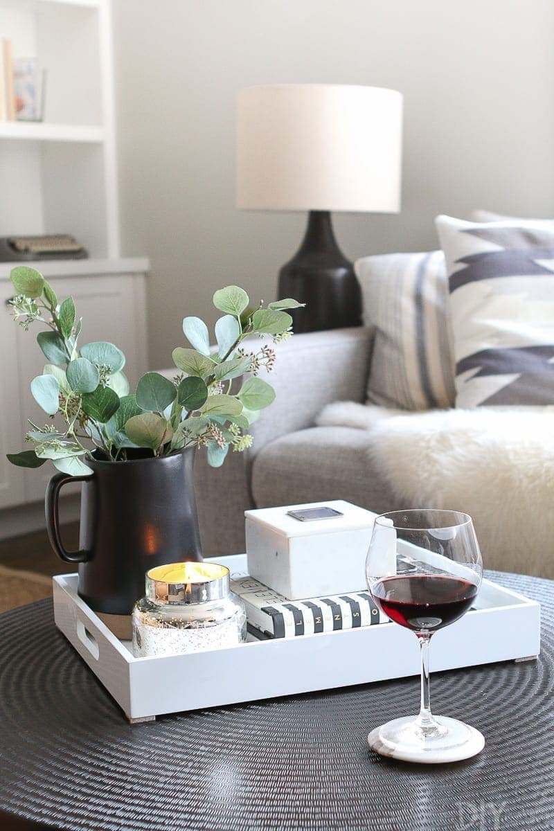 After dinner and cleaning the kitchen, I pour a glass of wine, light a candle, and enjoy my evening