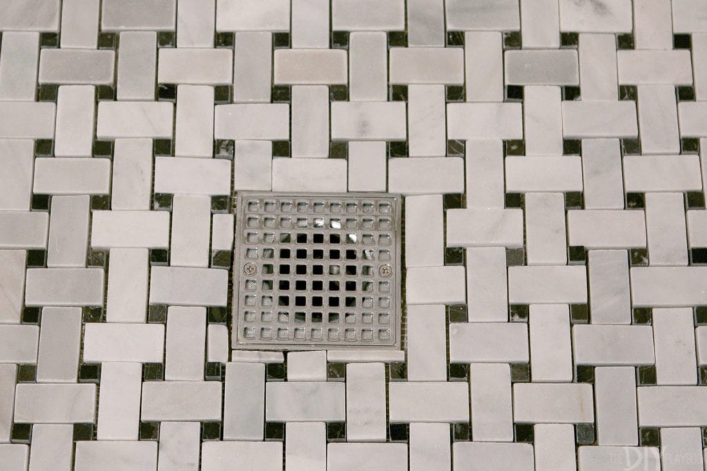 Figure out how to go around items like the drain when tiling