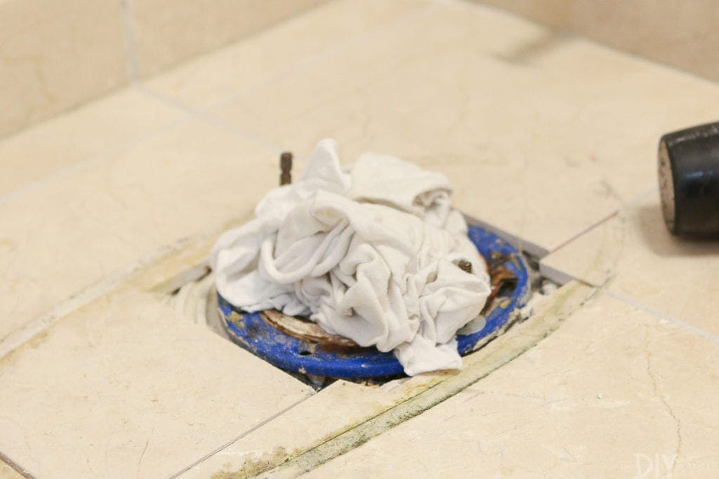 Plug the hole of a toilet so sewer gases don't come into your home