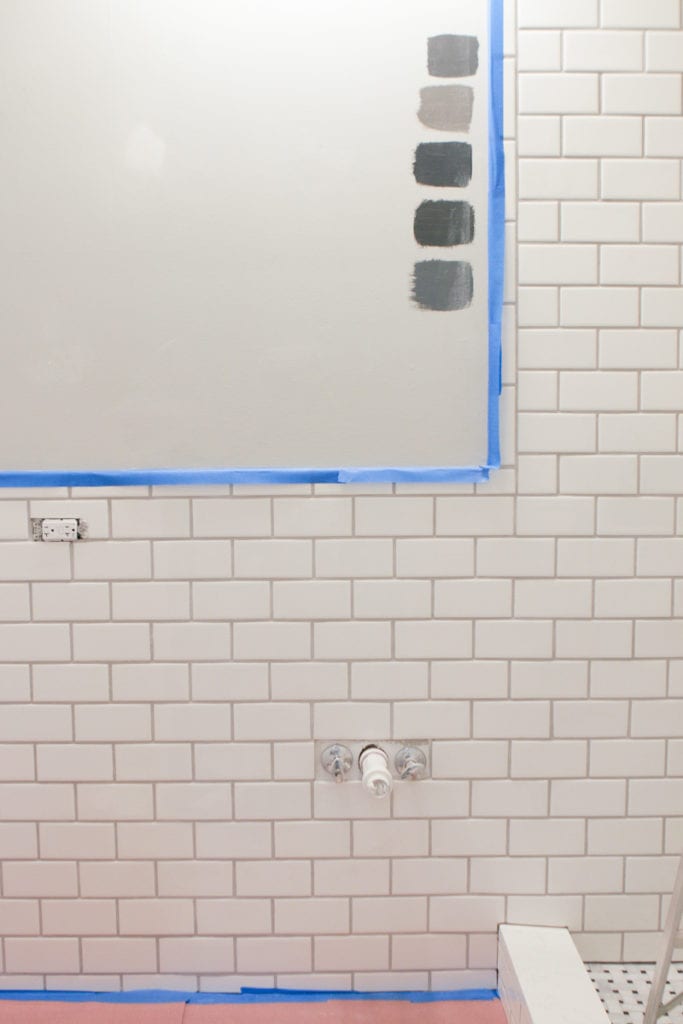 Clean your walls and use painter's tape to prep your room before painting