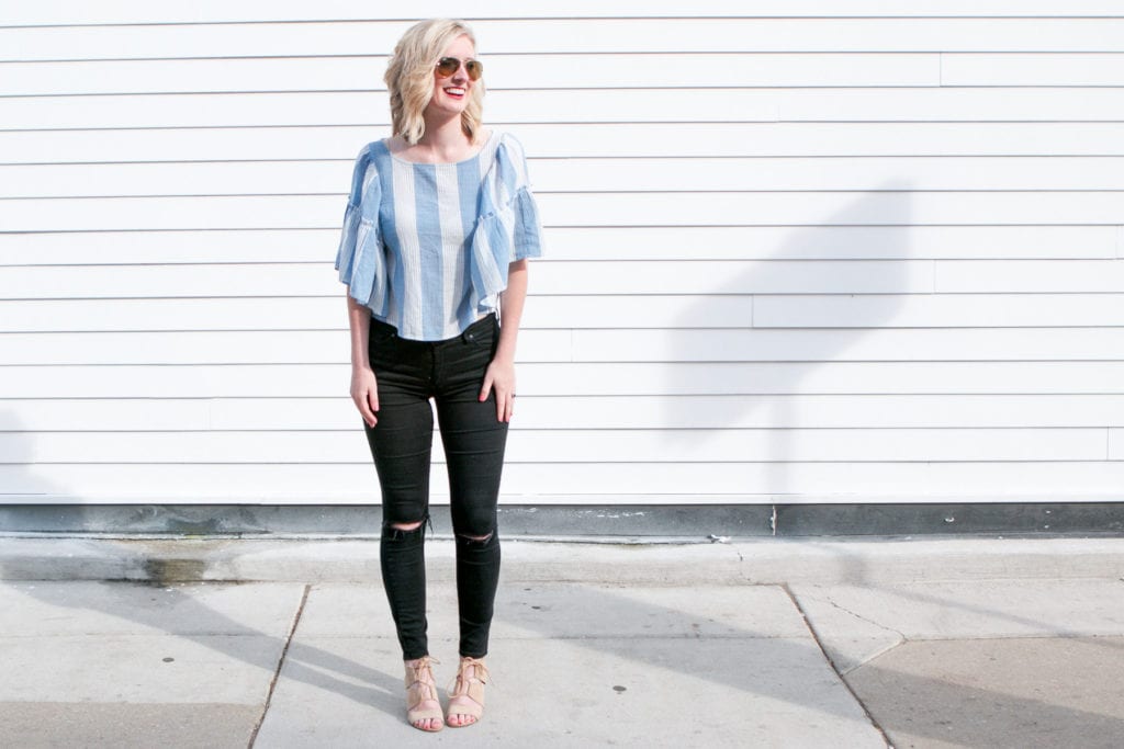 blue american eagle top with ripped jeans