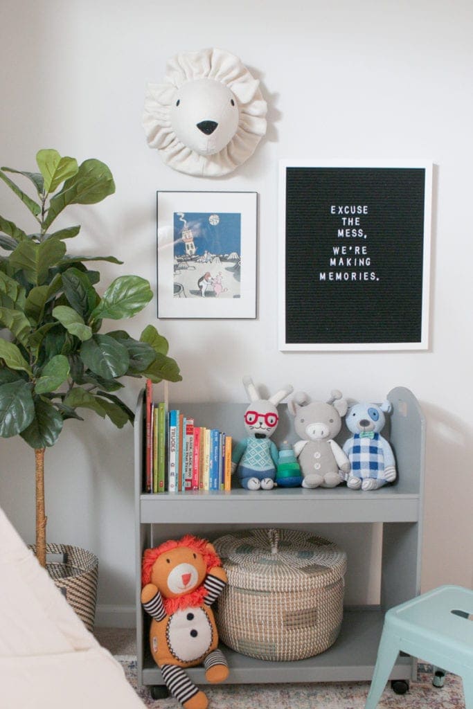 Use a rolling bookshelf to create an organized playroom