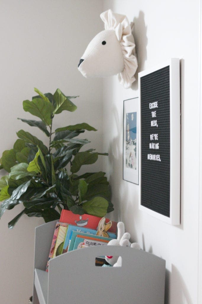 Add a stuffed animal head to your wall for a fun gallery wall