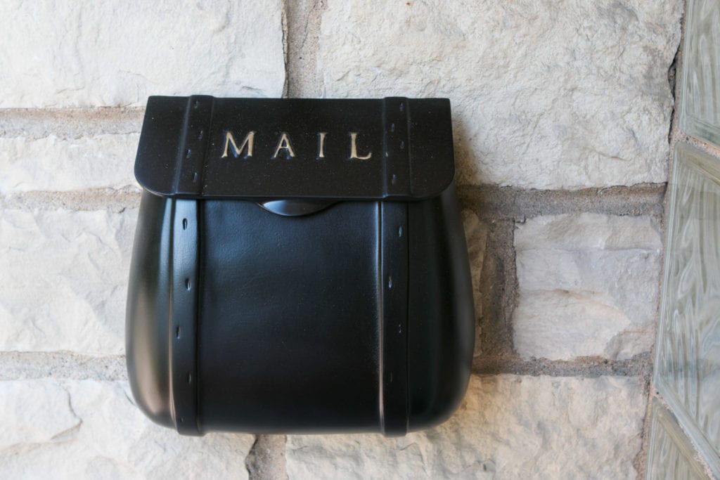 black mailbox with spray paint