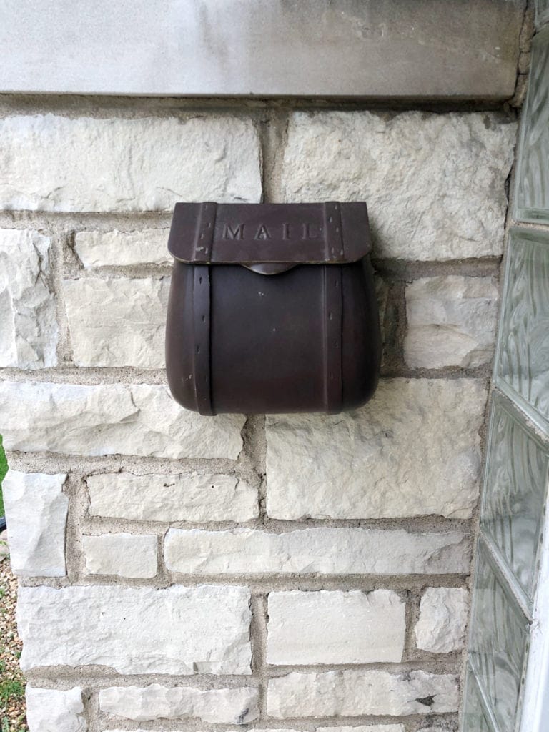 old brown mailbox before paint