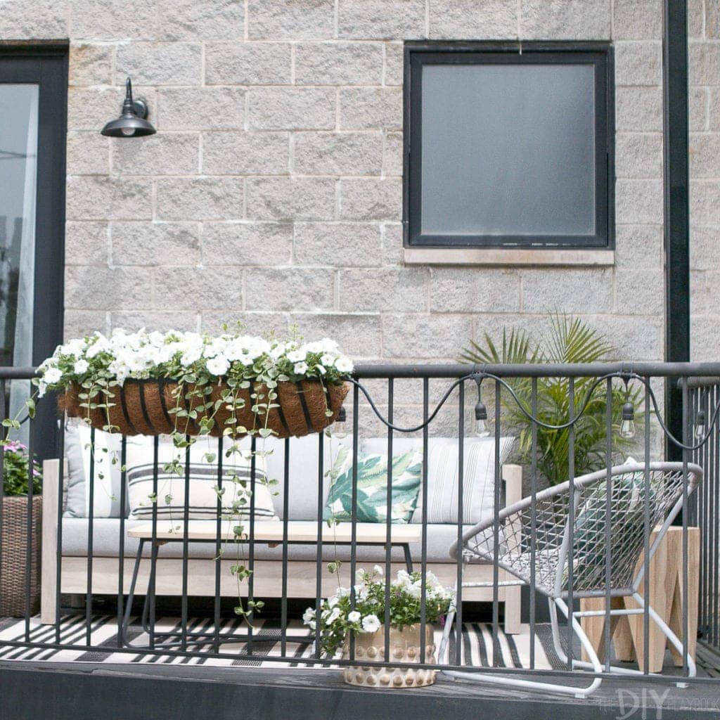 A small city balcony turned into an outdoor room