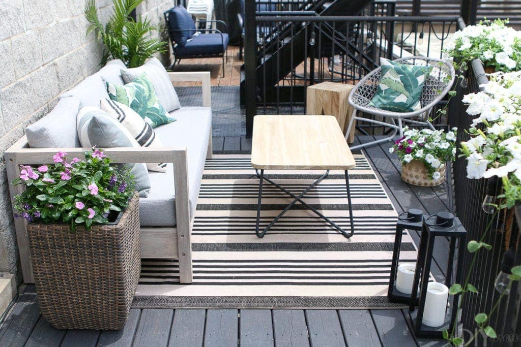 Power wash your outdoor rug to clean it well