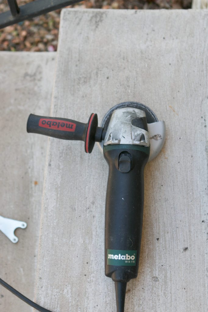 using a side grinder to remove railing spirals