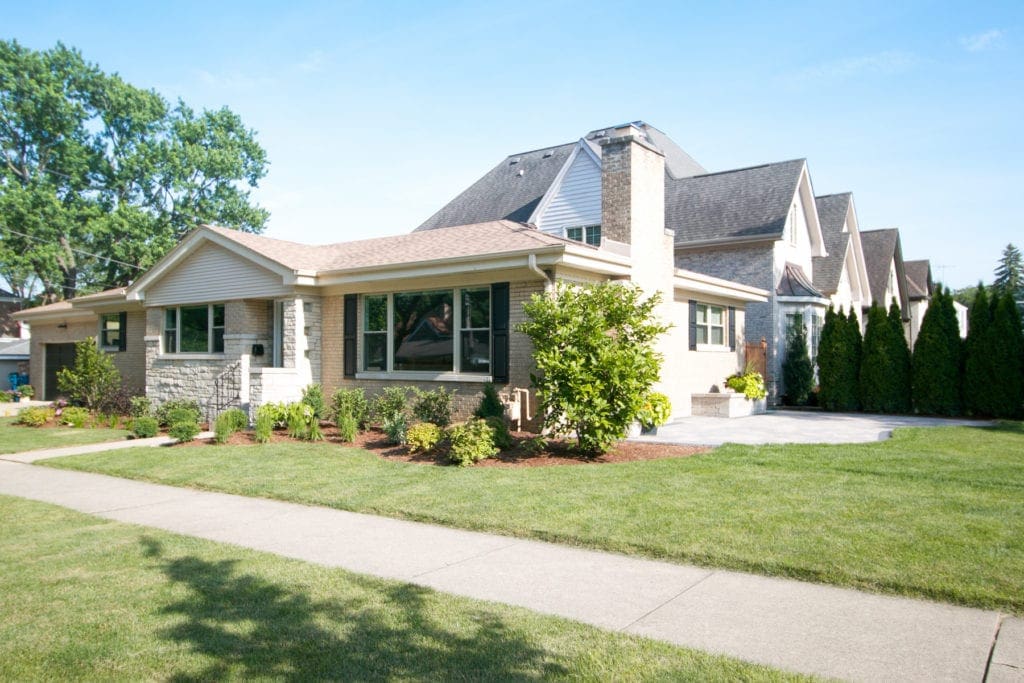 Adding a paver patio to the outside of a home can increase your home value and curb appeal