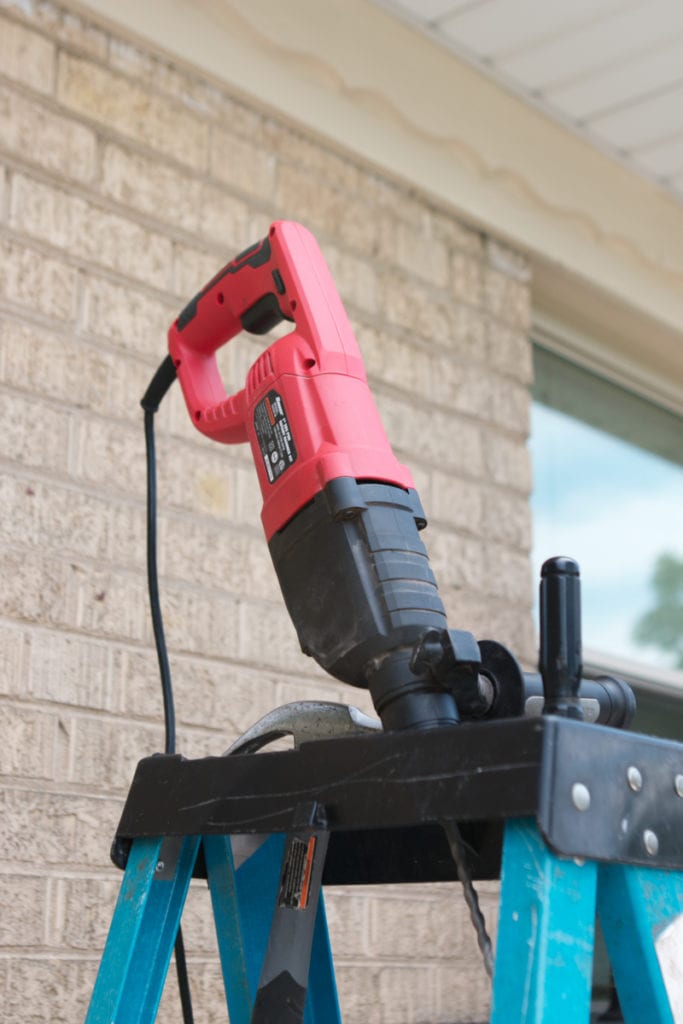 using a hammer drill to increase curb appeal