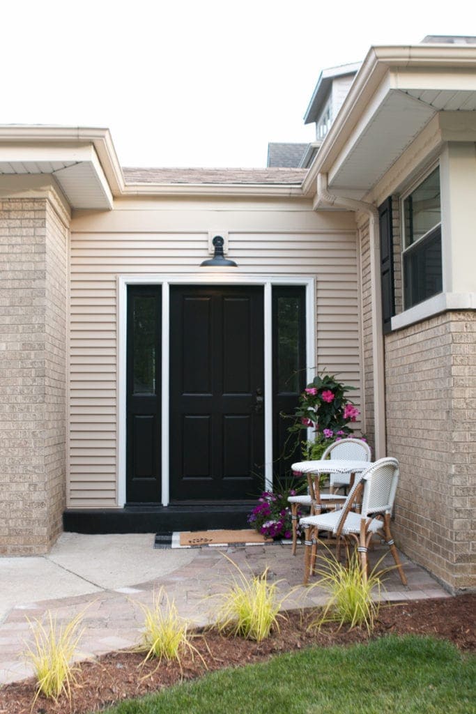 Small outdoor furniture set outside a mudroom door