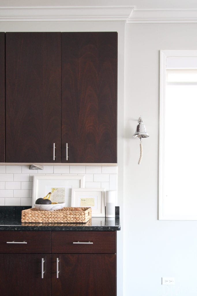 Use frames to hide outlets in your kitchen