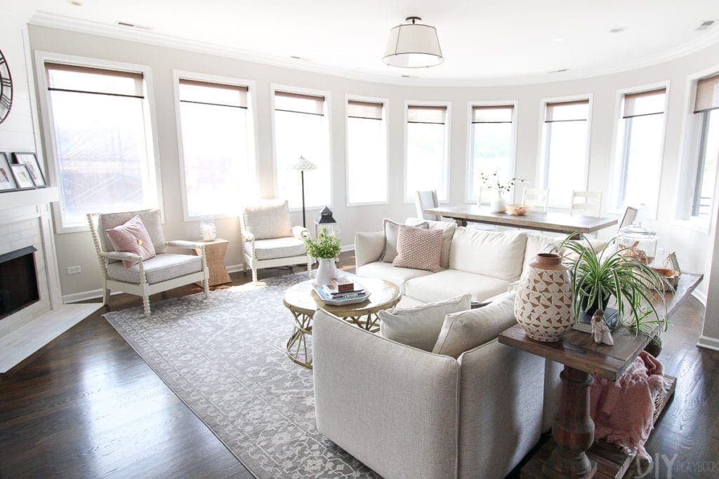 Large family room and dining room in farmhouse feminine style