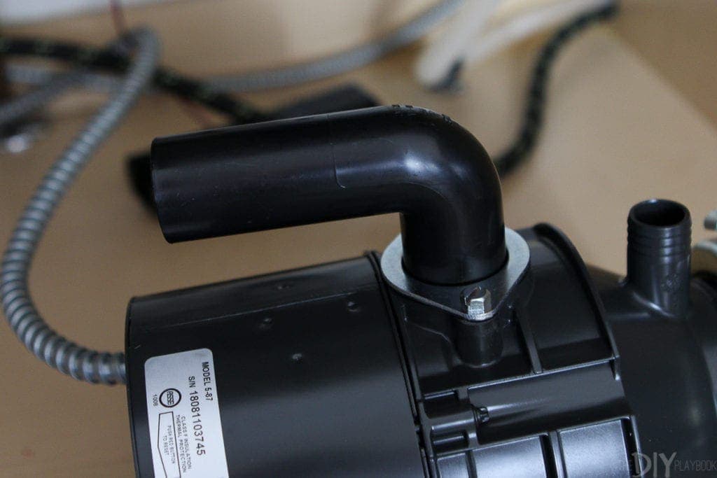 Attach the new discharge tube