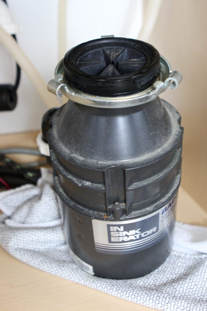Removing an old garbage disposal
