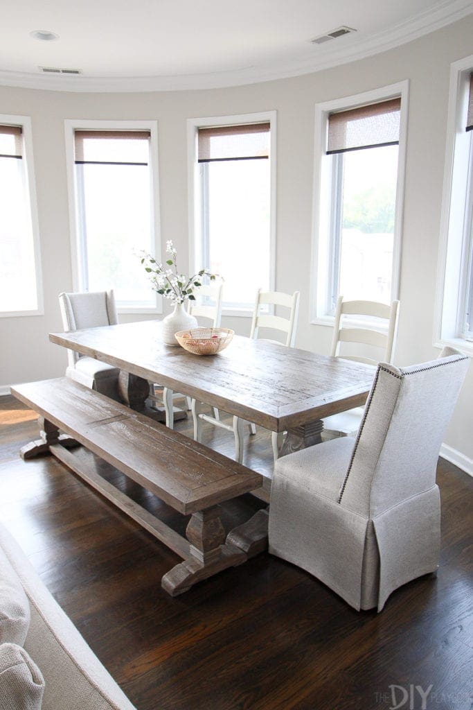 farmhouse dining room table with upholstered chairs