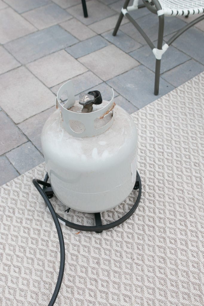 hiding an old propane tank on a patio
