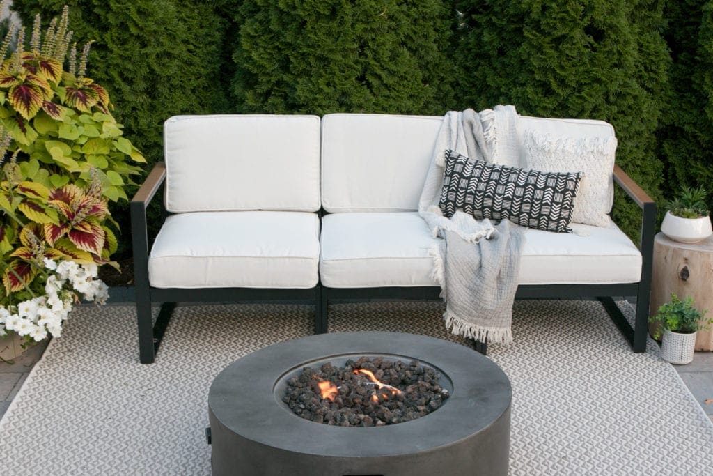 white patio couch in a patio reveal