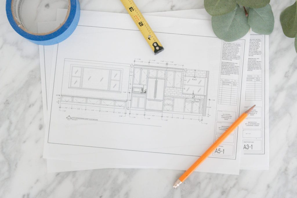 blueprints in the kitchen renovation