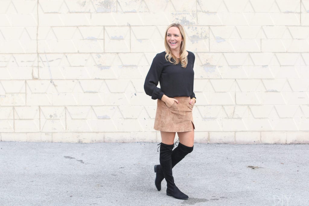 Black otk boots with a black blouse and skirt