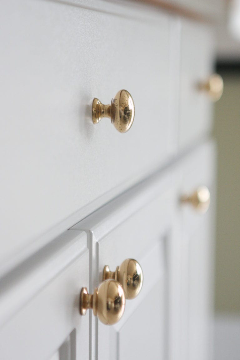 brass hardware from the 90's being replaced