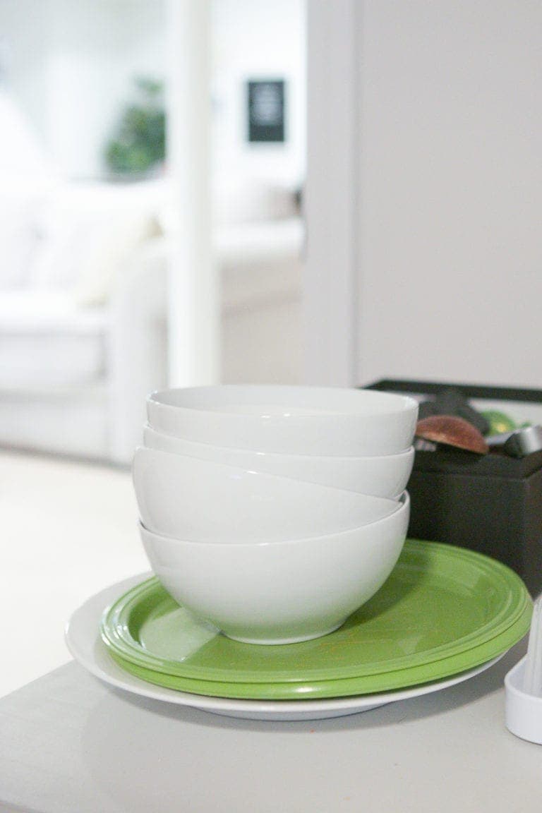 cleaning bowls in a temporary kitchen