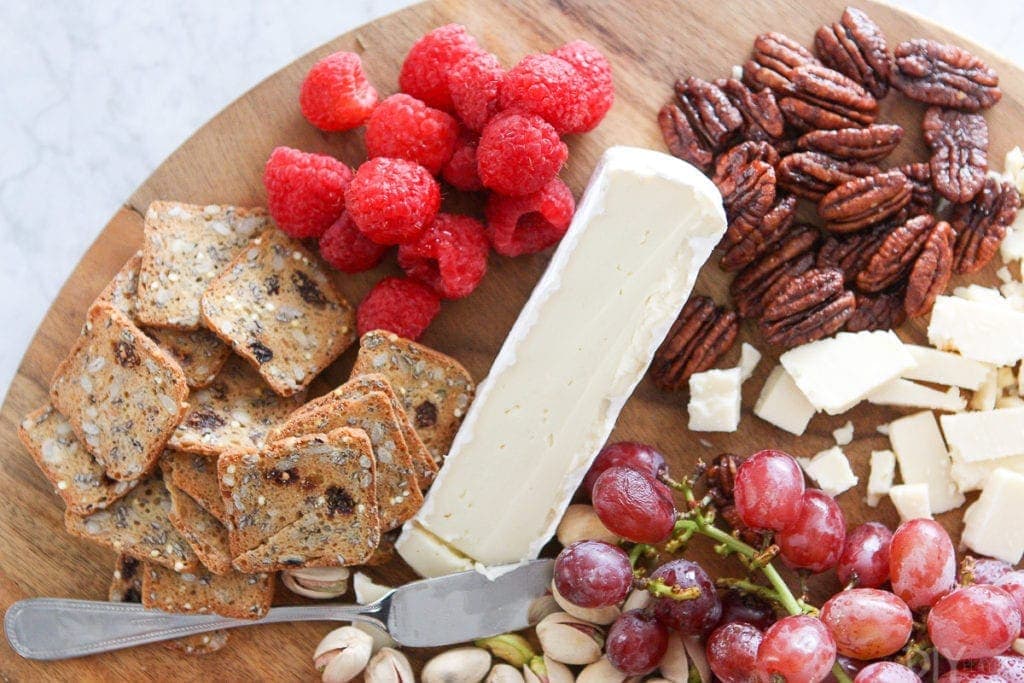 Put a cheese knife on your charcuterie board for easy slicing
