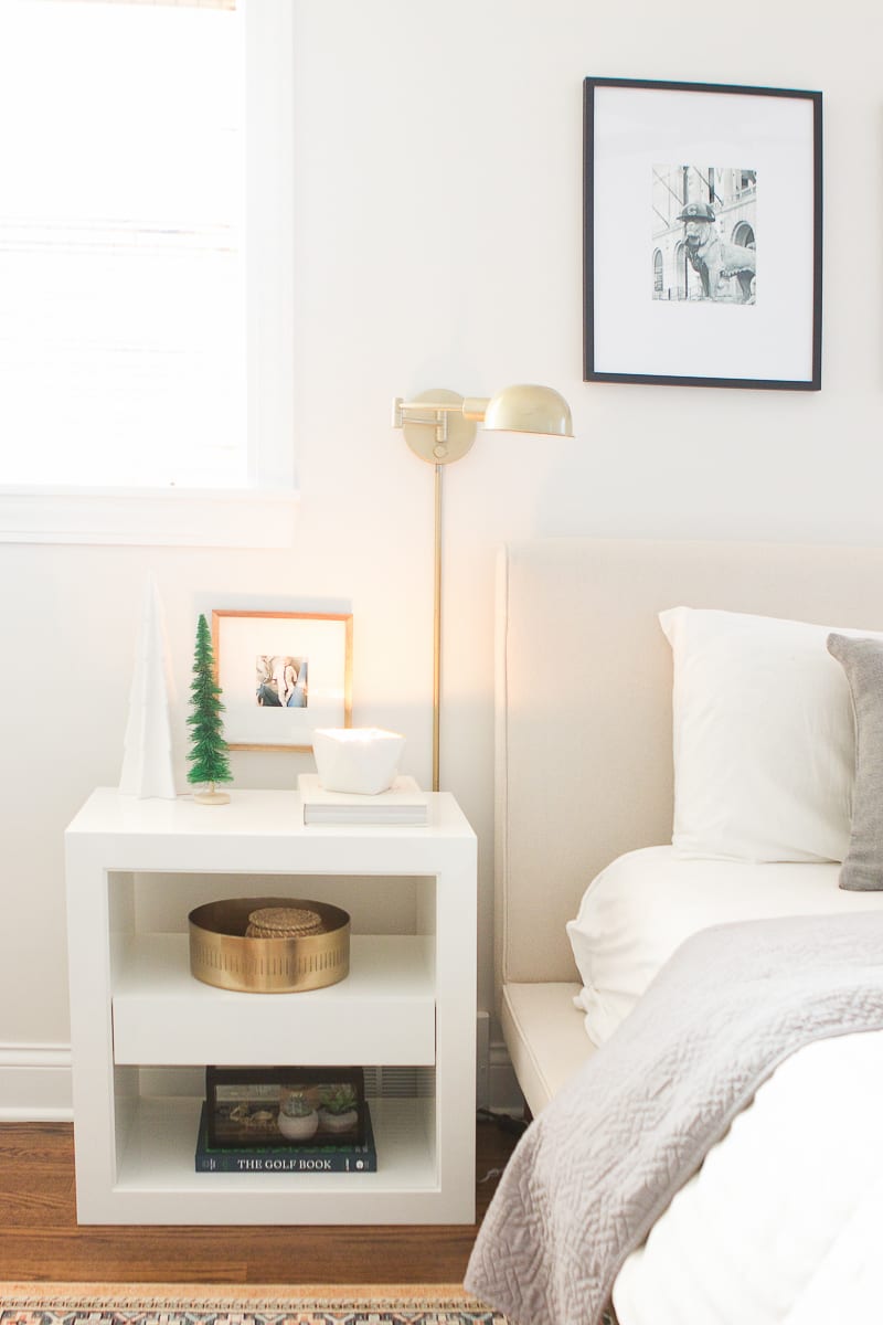 lighting a candle in the bedroom for the holidays