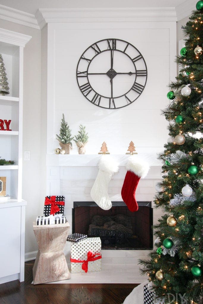 Fireplace mantle decorated for the holidays
