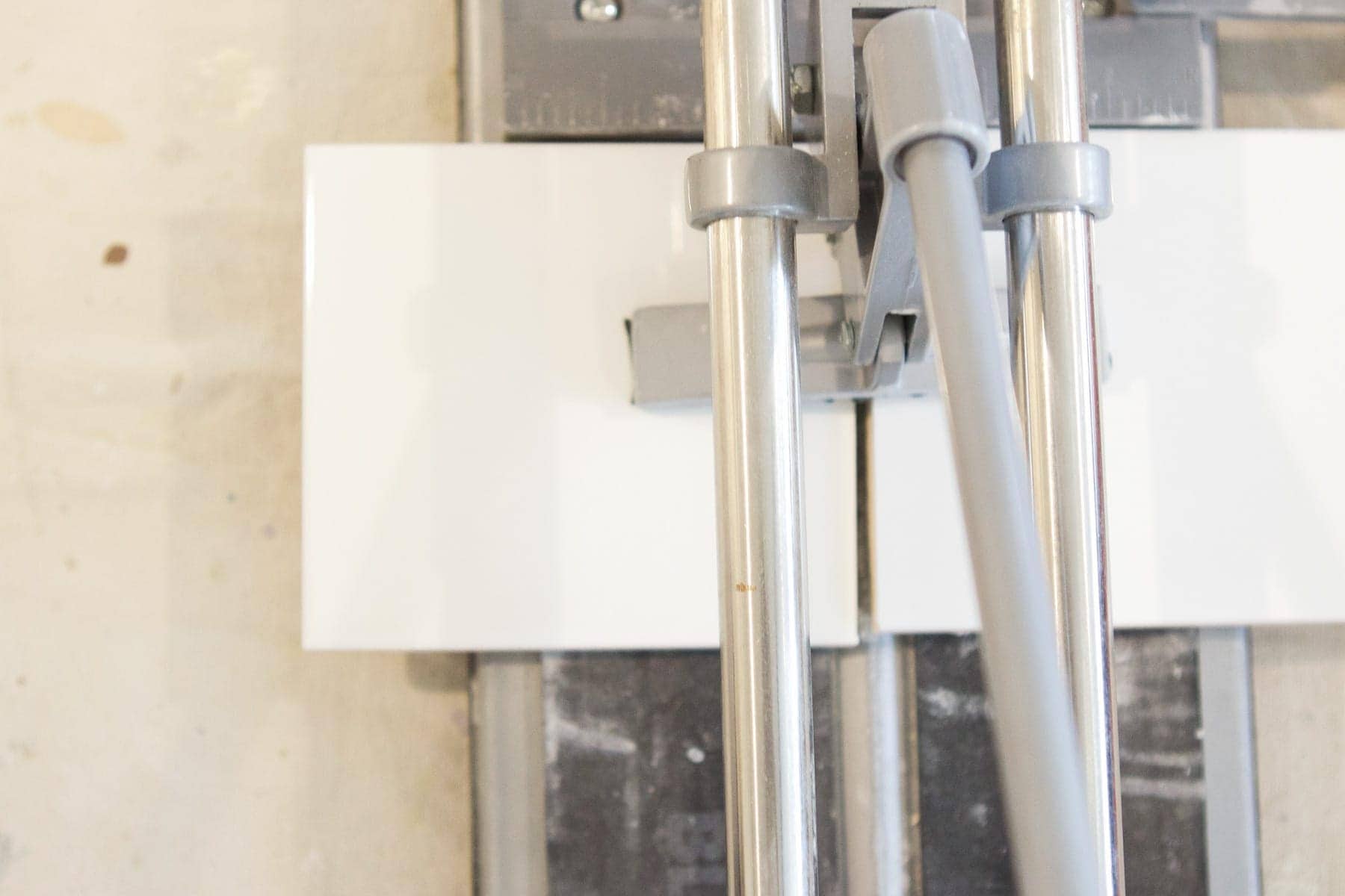 using a tile scorer to cut tile