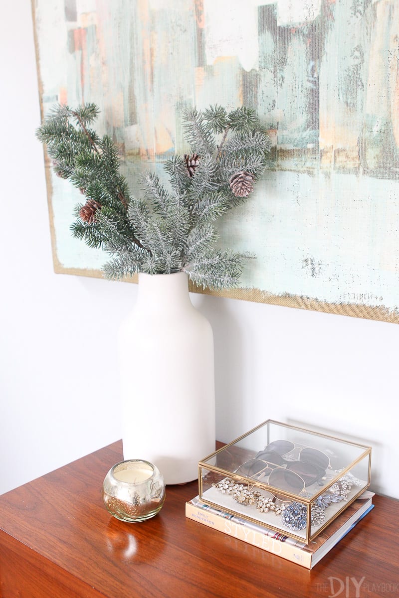 white vase with fresh greenery