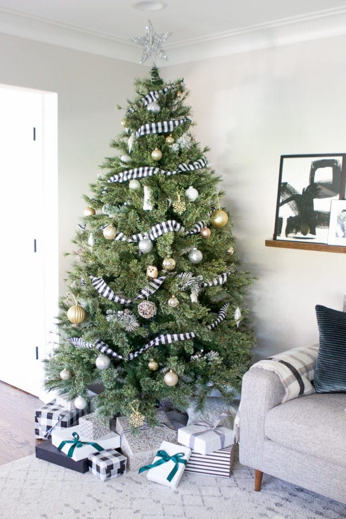 neutral christmas tree with buffalo check ribbon