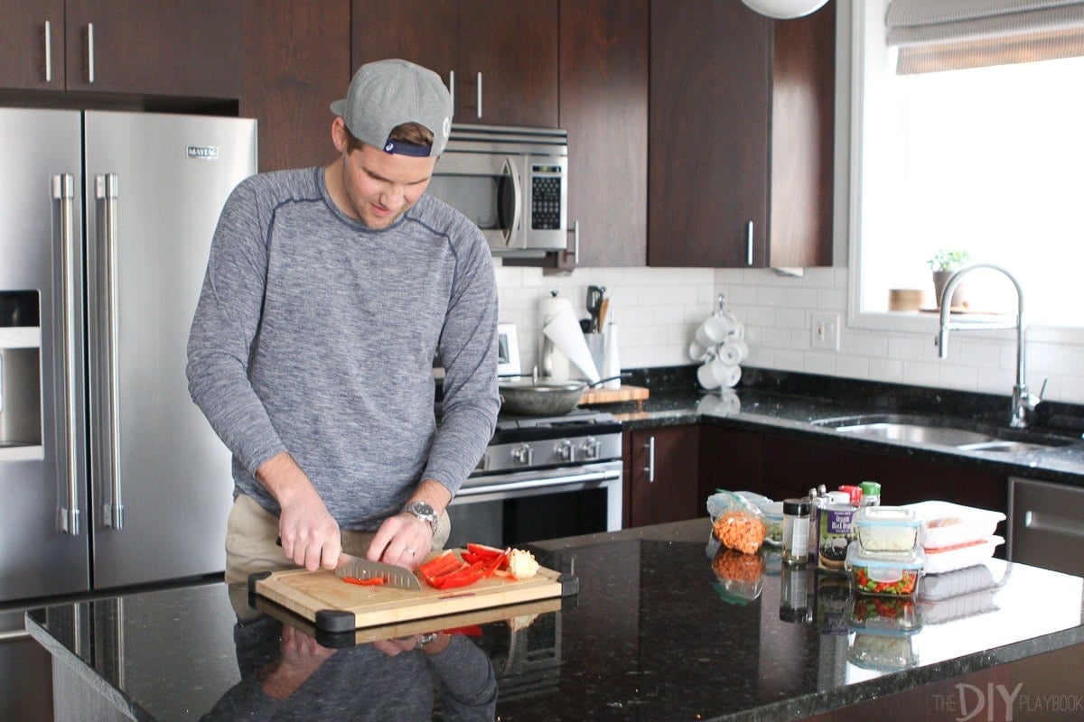 Finn prepping protein bowls for Frugal February