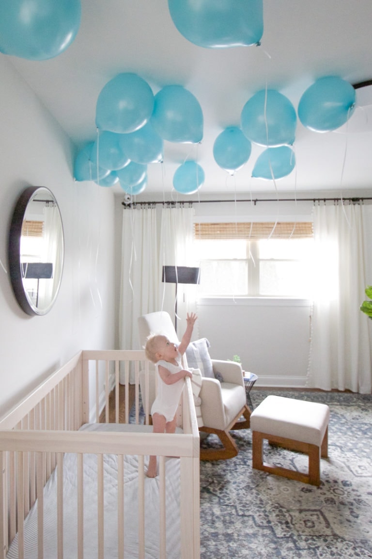 baby with balloons