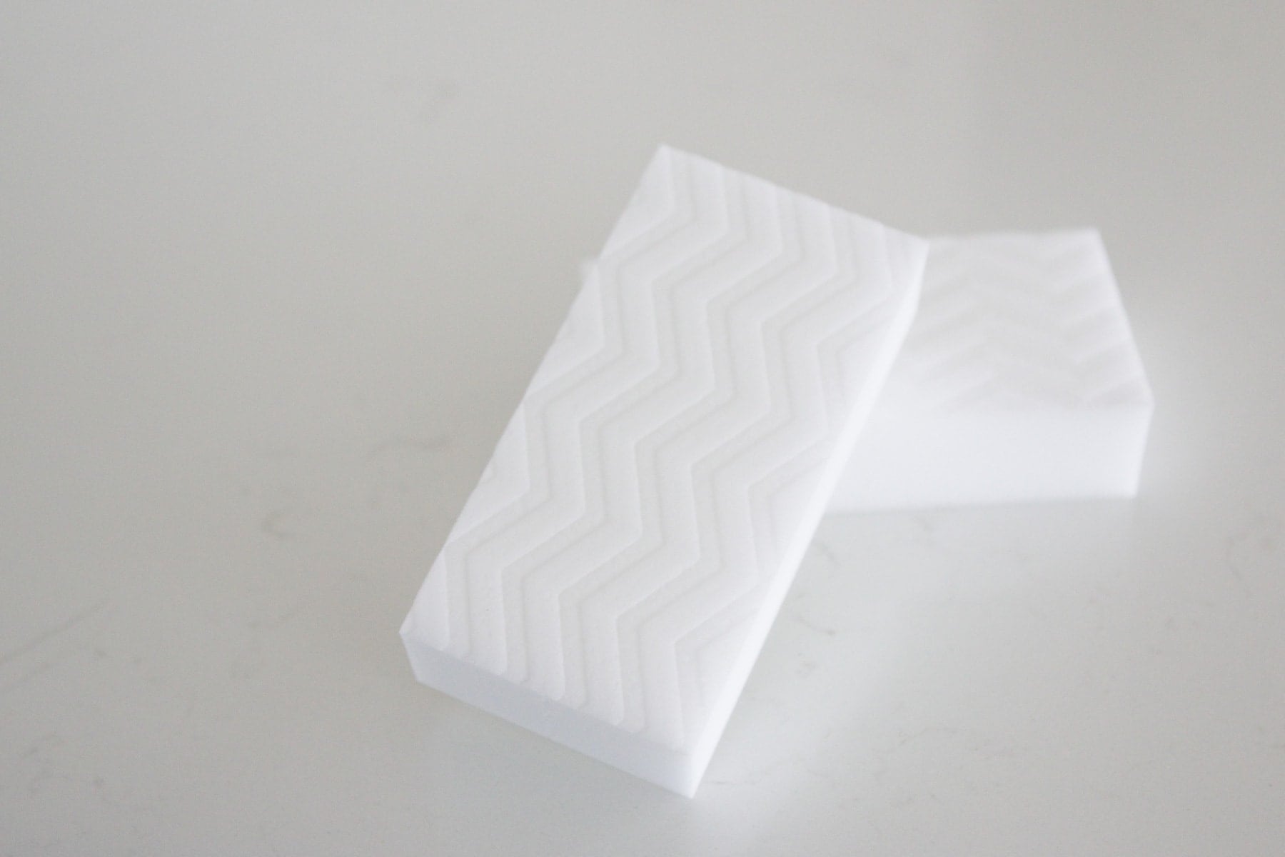 Use magic eraser to clean baseboards