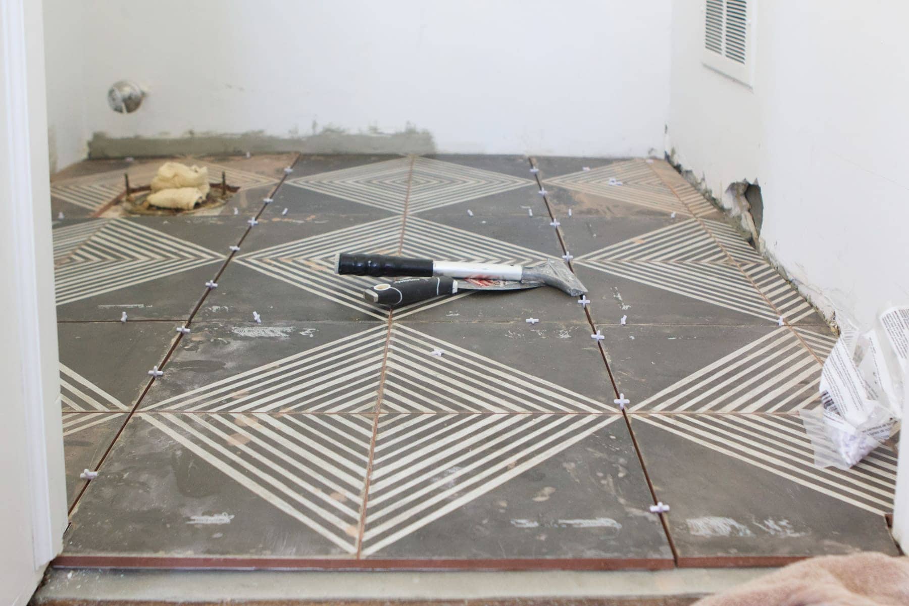 large geometric tile in the bathroom