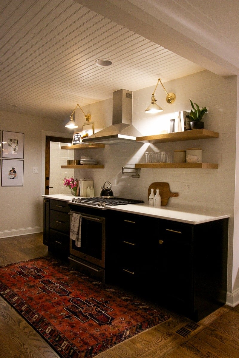 sconces above open shelving