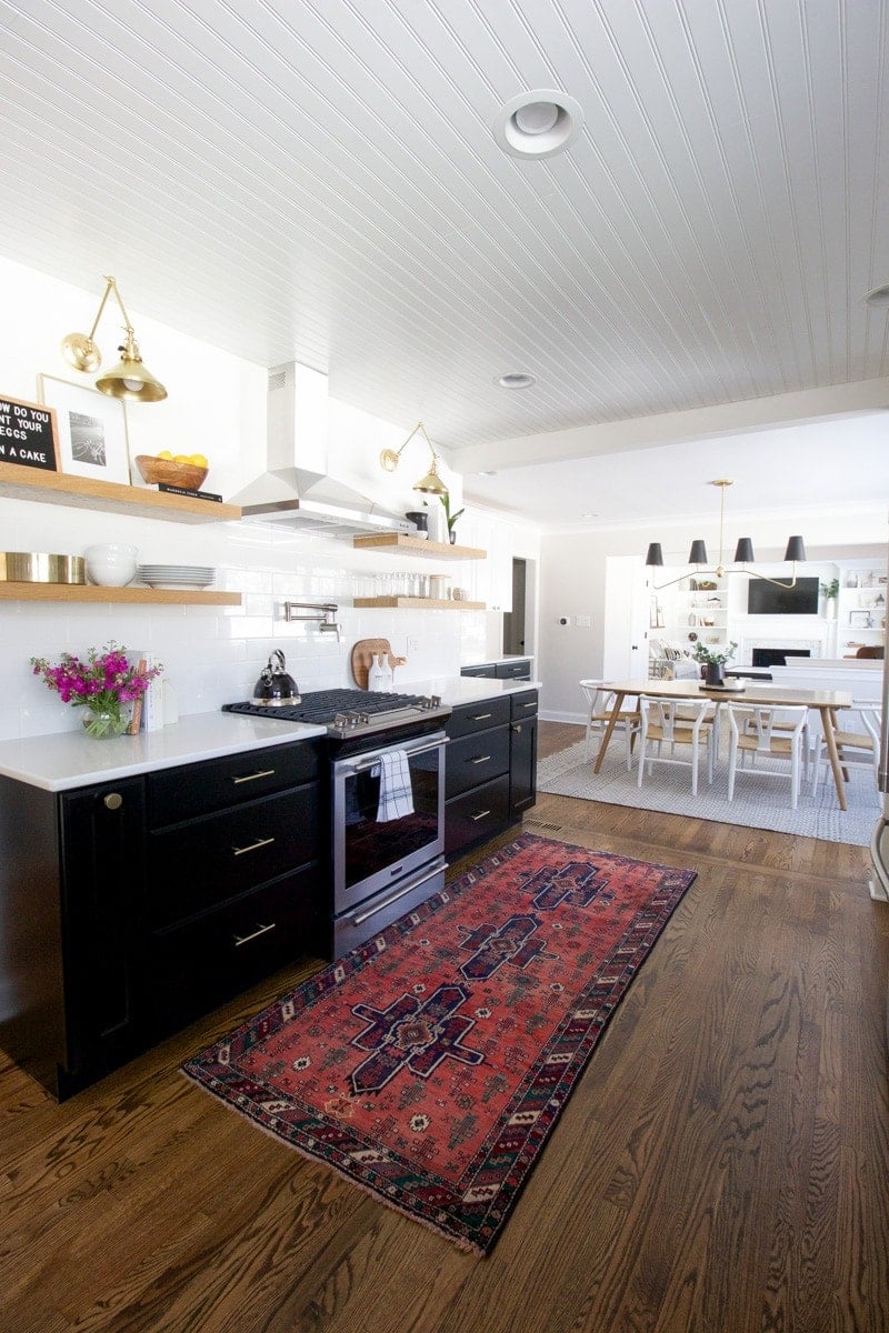 black cabinets with open shelves