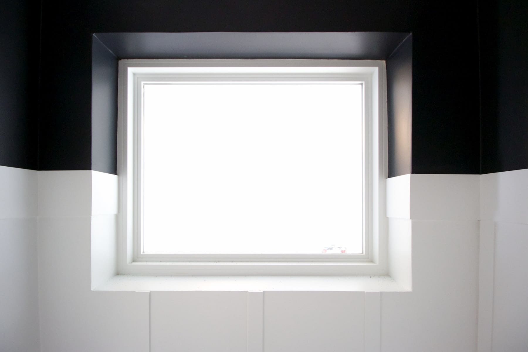 black and white paint around window