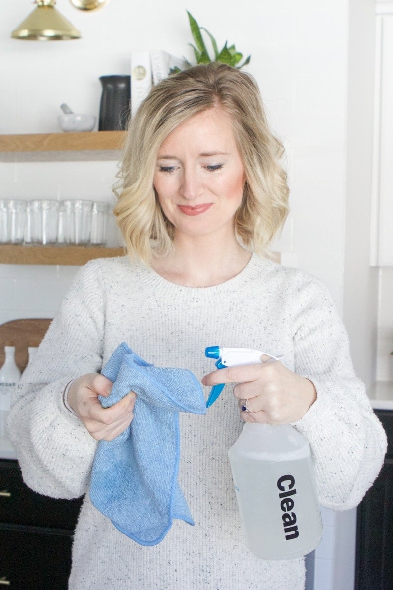 spraying DIY cleaner